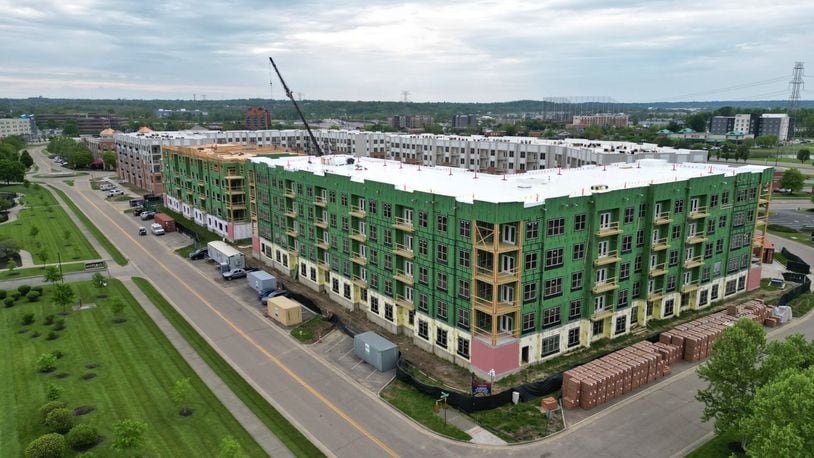 The $50 million Clocktower condo/apt. complex project at the high-profile center square of West Chester Twp. enters its final phase of construction and West Chester Township officials recently announced new plans to expand and add features to The Square @ Union Center to attract and cater to hundreds of new residents expected to move in by early 2025. These could include a splash park, public art and an outdoor performance stage. NICK GRAHAM/STAFF