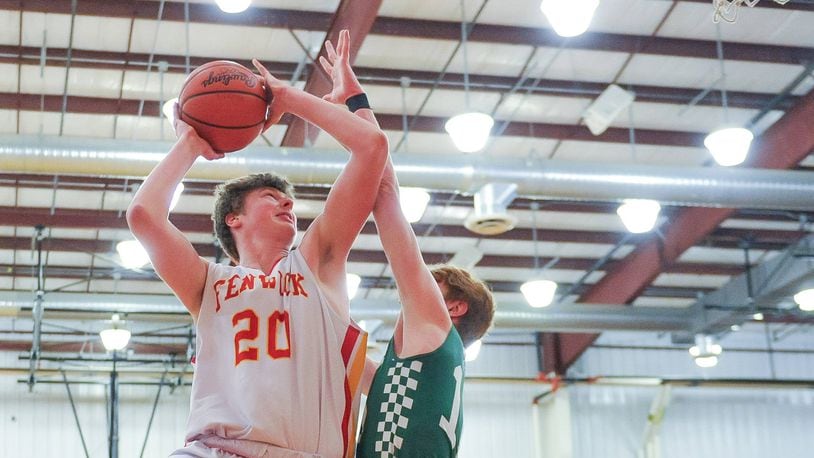 Fenwick's AJ Braun drives to the basket defended by Badin's Zach Switzer during their basketball game Friday, Jan. 18, 2019, at Bishop Fenwick High School in Middletown. Fenwick won 56-45. NICK GRAHAM/STAFF