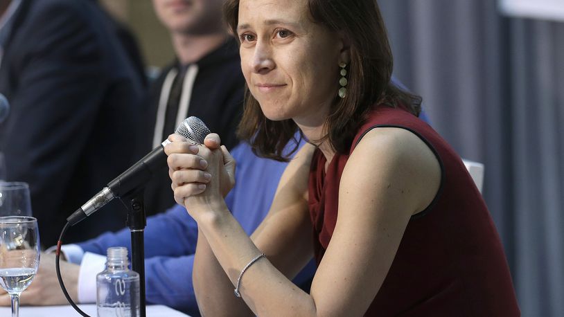 FILE - 23andMe CEO Anne Wojcicki speaks at an announcement for the Breakthrough Prize in Life Sciences at Genentech Hall on UCSF's Mission Bay campus in San Francisco, Feb. 20 2013. (AP Photo/Jeff Chiu, File)