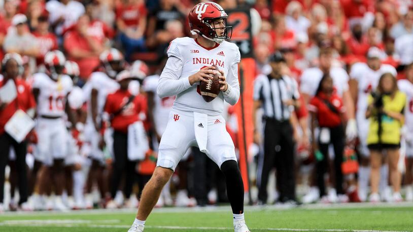 Indiana quarterback Connor Bazelak drops back to pass during the first half of an NCAA college football game against Cincinnati, Saturday, Sept. 24, 2022, in Cincinnati. (AP Photo/Aaron Doster)