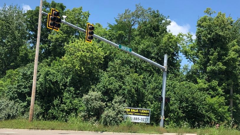 This property at the corner of Union Road and Market Avenue may be developed into a 240-unit apartment complex. Developers hope City Council rezones the property. RICK McCRABB/STAFF