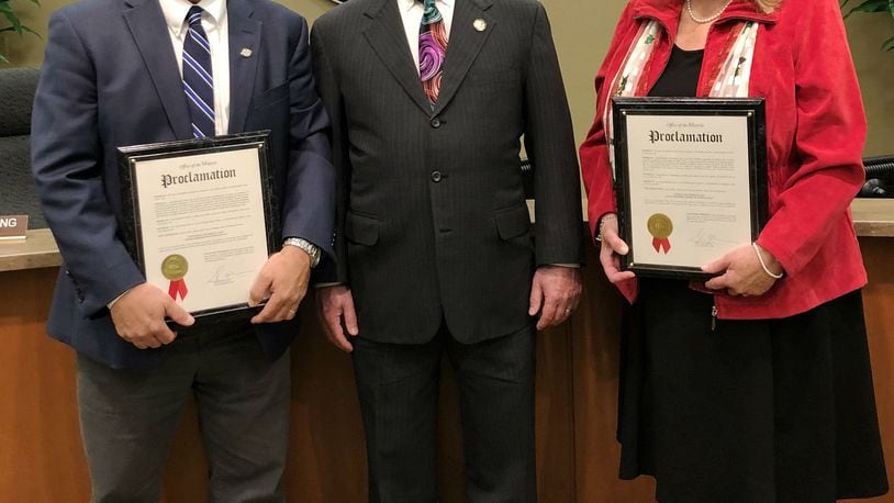 Fairfield Mayor Steve Miller (center) presented proclamations and plaques of appreciation to Council members Craig Keller (left) and Debbie Pennington (right) as they will end their service on City Council at the end of the year. Their last council meeting was on Monday, Dec. 9, 2019, and Miller proclaimed Dec. 10, 2019, as Debbie Pennington Day, and Dec. 11, 2019, as Craig Keller Day. PROVIDED