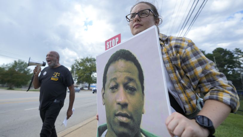 Rev. Hillary Taylor protests the planned execution of Freddie Eugene Owens, 46, on Friday, Sept. 20, 2024, in Columbia, S.C. Owens is set to be the first person to be executed in South Carolina in 13 years. (AP Photo/Chris Carlson)