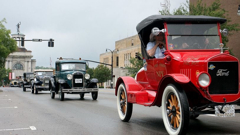 The 70th Annual Antique and Classic Car Parade of Hamilton and Fairfield will be held from 8:30 a.m.-5 p.m. July 27 starting at the Butler County Courthouse in Hamilton. The parade will head to Fairfield at 1 p.m. Photo is cars cruising down High St. during a previous year's parade. E.L. HUBBARD/FILE