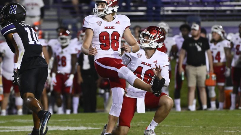 FILE - Then-Miami (Ohio) place kicker Graham Nicholson (98) looks on after kicking the game winning field goal against Northwestern as Alec Bevelhimer holds the ball during the second half of an NCAA college football game Saturday, Sept. 24, 2022, in Evanston, Ill. (AP Photo/Matt Marton, File)