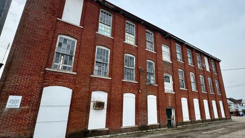 Pictured is the Shuler Benninghofen building, the former woolen mill in Lindenwald. The state is considering providing the redevelopment of the 129-year-old structure into a mixed-used development which would provide residential opportunities as well as commercial and restaurant spaces. MICHAEL D. PITMAN/STAFF