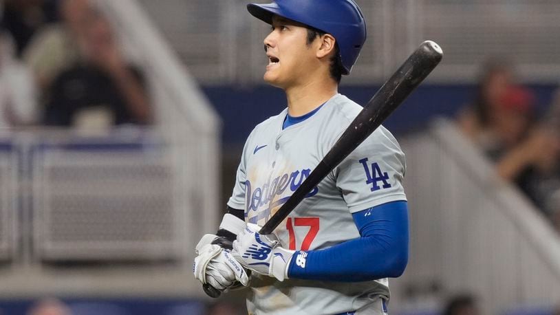 Los Angeles Dodgers' Shohei Ohtani (17) reacts after striking out during the fourth inning of a baseball game against the Miami Marlins, Wednesday, Sept. 18, 2024, in Miami. (AP Photo/Marta Lavandier)