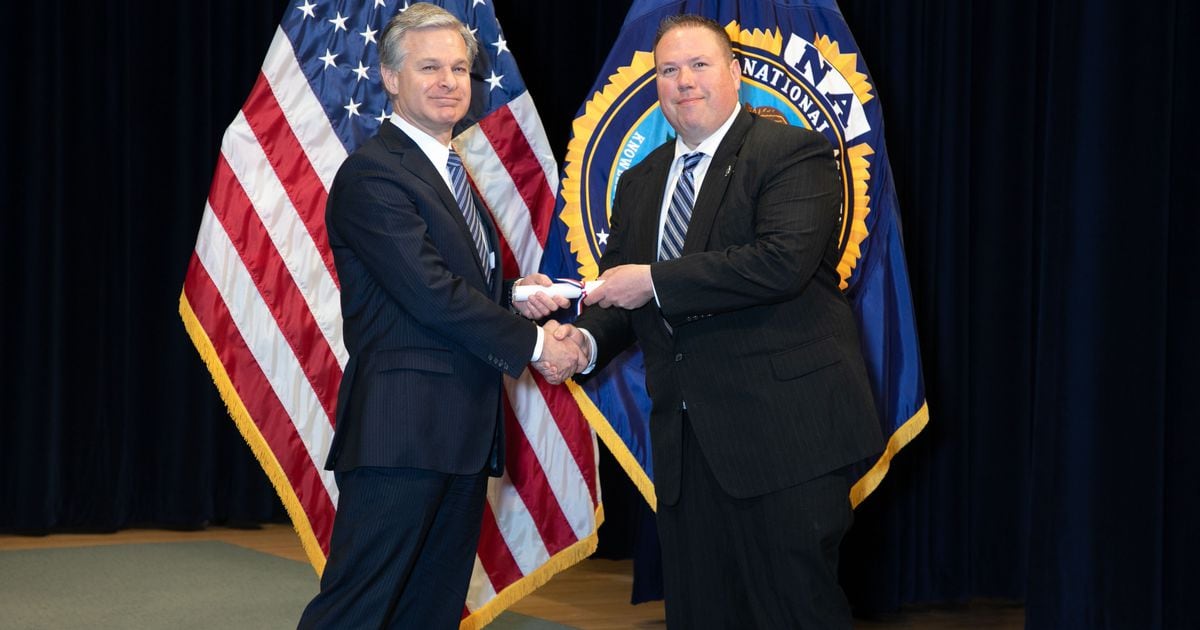 Oxford police chief receives surprise recognition following FBI academy