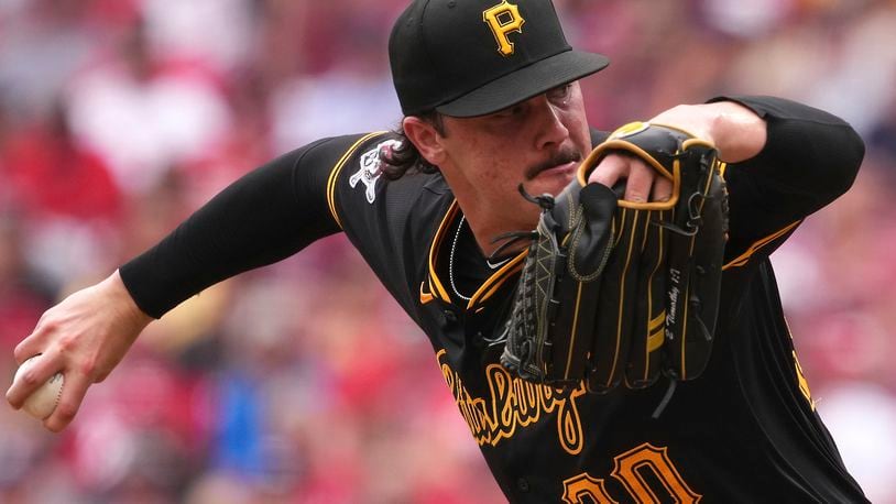 Pittsburgh Pirates' Paul Skenes delivers a pitch during the fourth inning of a baseball game against the Cincinnati Reds, Sunday, Sept. 22, 2024, in Cincinnati. (AP Photo/Kareem Elgazzar)