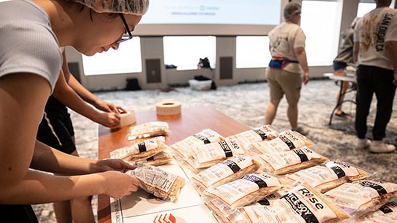 More than 35,000 emergency meal packages were recently assembled by 175 students, as part of Miami’s Rise Against Hunger campaign conducted during the start of the school year.
And each 1,000 packages assembled were celebrated with the ringing of gong throughout the main Oxford campus’ Armstrong Student Center, school officials said. (Contributed/Journal-News)