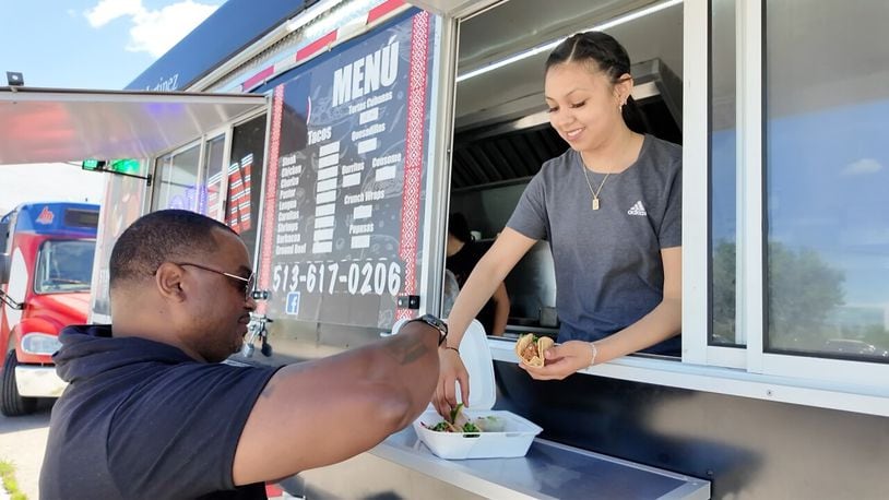 Food is served at the Taqueria Martinez food truck in Norwood. WCPO/CONTRIBUTED