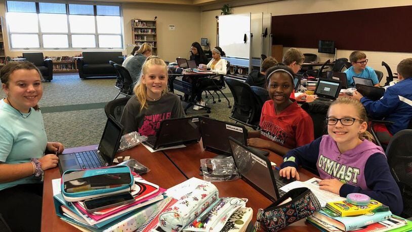 For the first time in the history of Lakota Schools, all students, regardless of grade level, are now getting part of their classroom instruction via learning laptops. The digital milestone was recently announced by Lakota officials and it marks the finalization of a multi-year effort, which began in 2018, pictured are Lakota students that school year, to provide free laptop access to all 17,800 students in Butler County’s largest school system. FILE PHOTO
