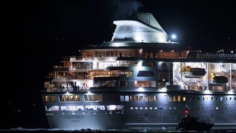 The Villa Vie Odyssey cruise ship leaves Belfast Harbour after the luxury cruise ship became marooned in Belfast, Northern Ireland, for four months due to unexpected repair works, Monday, Sept. 30, 2024. (Liam McBurney/PA via AP)