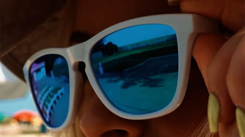 Kings Island has just launched a teaser for a new ride in 2025. The 8-second video, uploaded to the park’s social media sites, shows a woman in sunglasses looking at a temporary fence with blue waves painted on it, the fencing reflected in her glasses. WCPO