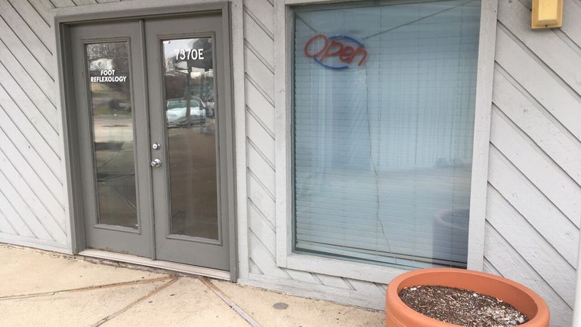 The door to Reflexology in West Chester. The massage parlor was raided by West Chester police and the Ohio Bureau of Investigation in December. Three human trafficking victims were discovered during the raid. CONTRIBUTED / CRAIG CHATHAM