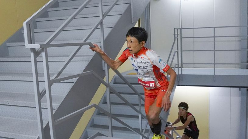 In this photo provided by ISF/Meeting, runner Yuri Yoshizumi competes during a race of Stairclimbing World Championships in Osaka, western Japan, on Nov. 19, 2023. (ISF/MEETING via AP)