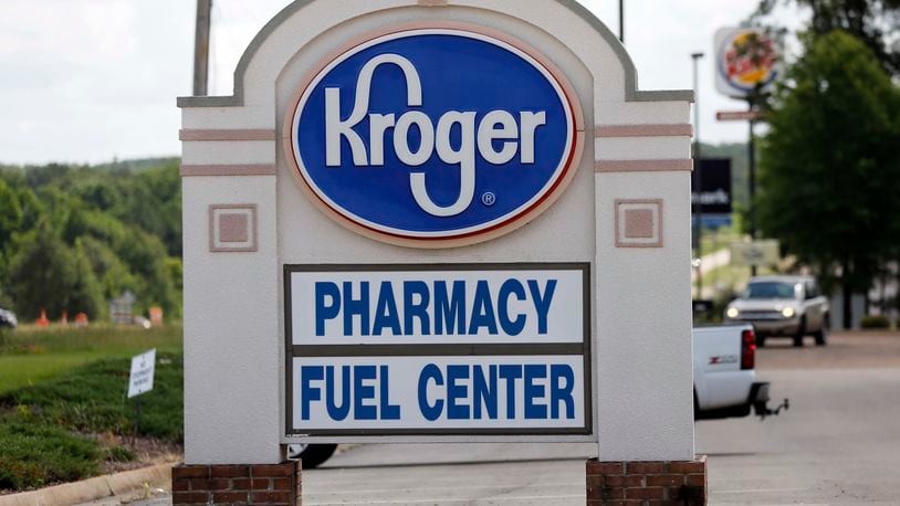 FILE - A Kroger grocery store sign promotes its pharmacy and fuel center at its Flowood, Miss., location, Thursday, June 15 2017. Kroger on Friday, Sept. 8, 2023, announced an agreement to pay up to $1.2 billion to settle lawsuits that claimed the company contributed to the U.S. opioid crisis. (AP Photo/Rogelio V. Solis, File)