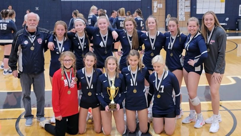 Talawanda Middle School’s eighth-grade volleyball team finished the season undefeated at 16-0 after recording an undefeated 18-0 season a year ago. They now head to the high school with a history of success on their resume. They are shown with the trophy for winning the Southwest Ohio Conference championship. CONTRIBUTED