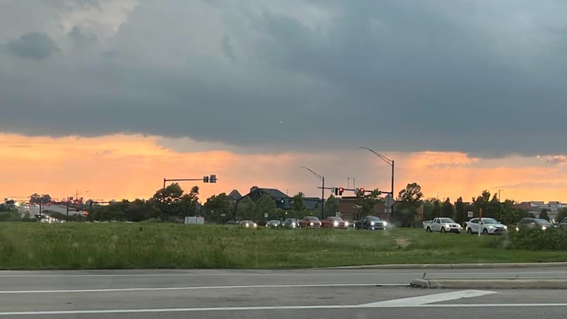 A storm can be seen in the distance Wednesday evening, May 22, 2024, near Austin Landing in Miami Twp. DANIEL SUSCO, STAFF