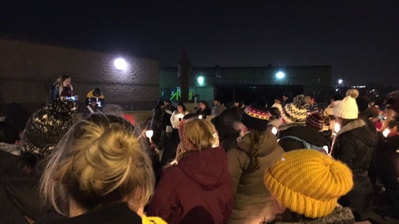 More than 100 people from throughout southwest Ohio braved freezing temperatures Monday night to attend a candlelight vigil raising awareness about human rights abuses committed in the name of immigration enforcement. The vigil, which lasted just over an hour, was held at the Butler County Jail which also houses an ICE detention facility. It was organized by several organizations affiliated with the University of Dayton. ED RICHTER/STAFF