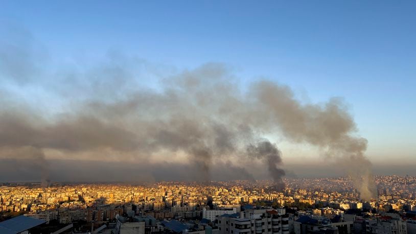 Smoke rises from Israeli airstrikes in the southern suburbs of Beirut, Lebanon, Saturday, Sept. 28, 2024. (AP Photo/Hussein Malla)