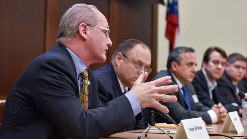 Senator Bill Beagle answers a question during a candidates forum Monday, Feb. 22, 2016, at the VOA Learning Center in West Chester Twp. Fourteen of the 17 candidates for the 8th Congressional District race attended the forum. Of those attending, 13 were Republicans and one was a Democrat. They are seeking to replace former U.S. House Speaker John Boehner, R-West Chester Twp., in Congress. NICK GRAHAM/STAFF