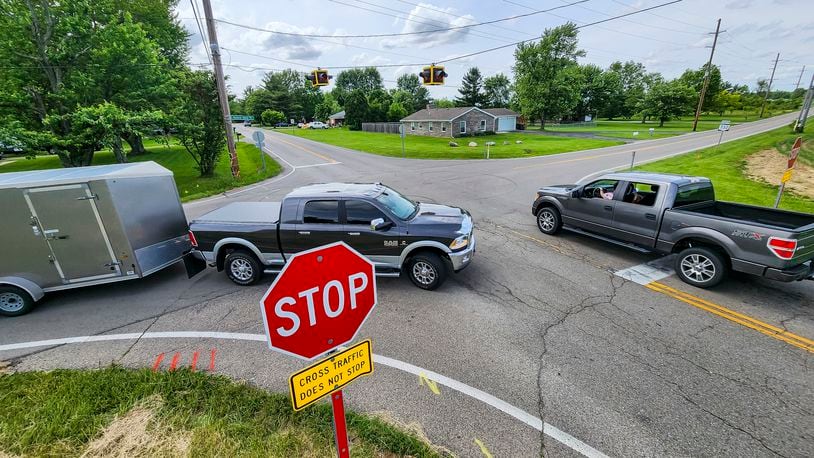 The intersection of Ohio 732 and Stillwell Beckett Road will change to a 4-way stop before work starts on a roundabout at the intersection. NICK GRAHAM/STAFF
