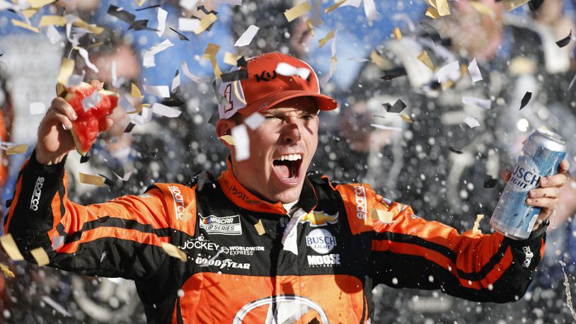 Ross Chastain celebrates in Victory Lane after winning a NASCAR Cup Series auto race at Kansas Speedway in Kansas City, Kan., Sunday, Sept. 29, 2024. (AP Photo/Colin E. Braley)