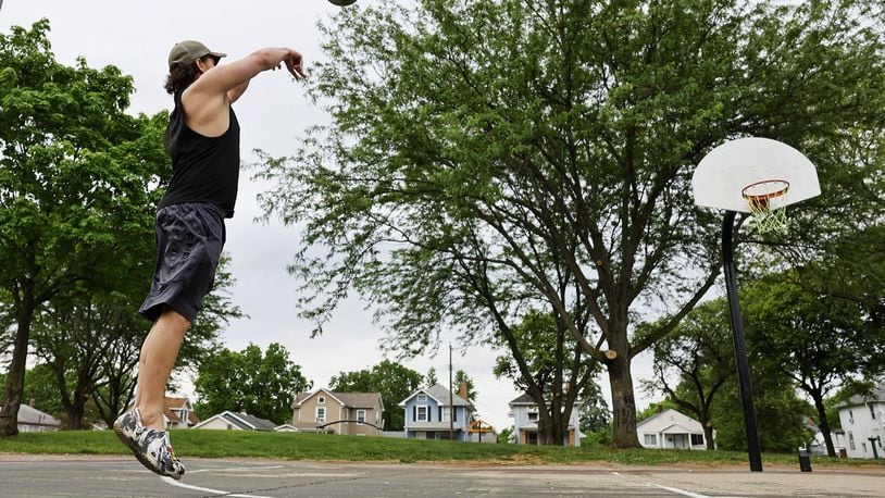 Gregory Rhodes shoots hoops on the basketball court at Sherman Park Wednesday, May 8, 2024 in Middletown. NICK GRAHAM/STAFF