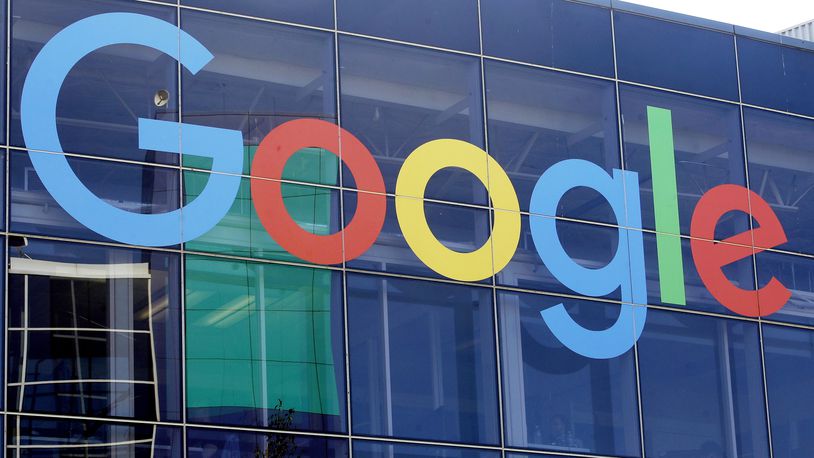 FILE - A sign is shown on a Google building at their campus in Mountain View, Calif., on Sept. 24, 2019. (AP Photo/Jeff Chiu, File)