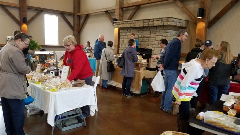 FILE: The winter farmers market at the Muhlhauser Barn in West Chester Twp. CONTRIBUTED