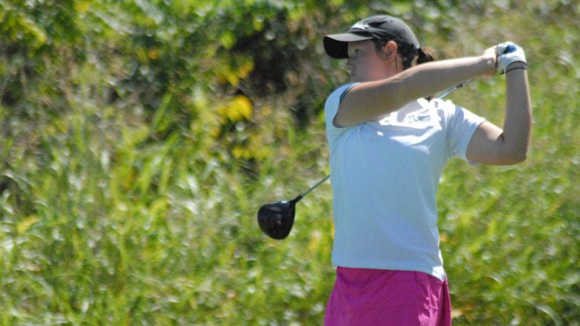 Lakota East’s Clare Yeazell tees off on the 18th hole during the second round of the Greater Miami Conference championship at Walden Ponds Golf Club. Chris Vogt/CONTRIBUTED