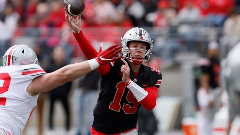 FILE - Ohio State quarterback Devin Brown throws a pass during an NCAA college spring football game Saturday, April 16, 2022, in Columbus, Ohio. Ohio State opens their season on Sept. 2 at Indiana. (AP Photo/Jay LaPrete, File)