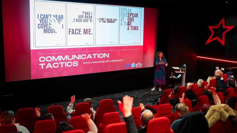 Yvonne Cobb, ambassador for the British Deaf Association, speaks to front of house cinema staff about deaf awareness training, on Wednesday, Oct. 2, 2024 in London.(Photo by Scott A Garfitt/Invision/AP)