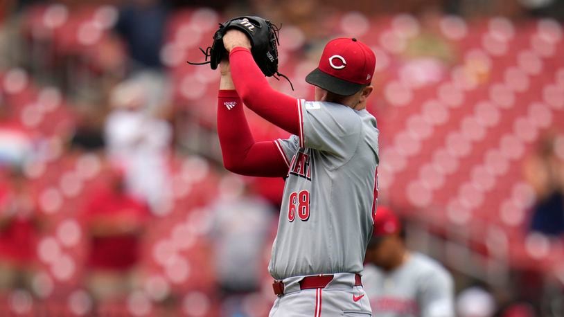 Cincinnati Reds starting pitcher Carson Spiers pauses after giving up a two-run home run to St. Louis Cardinals' Brendan Donovan during the seventh inning of a baseball game Thursday, Sept. 12, 2024, in St. Louis. (AP Photo/Jeff Roberson)