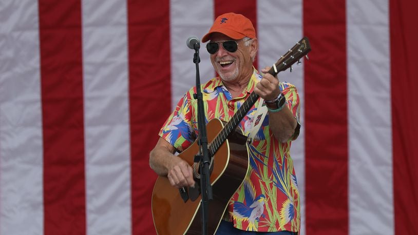 WEST PALM BEACH, FLORIDA - NOVEMBER 03: Jimmy Buffett plays a song as he performs at a Get Out the Vote rally for U.S. Senator Bill Nelson (D-FL) and Florida Democratic governor candidate Andrew Gillum at the Meyer Amphitheatre on November 03, 2018 in West Palm Beach, Florida. Mr. Buffett was encouraging people to vote for Sen. Nelson and Mayor Gillum who are in tight races against their Republican opponents. (Photo by Joe Raedle/Getty Images)