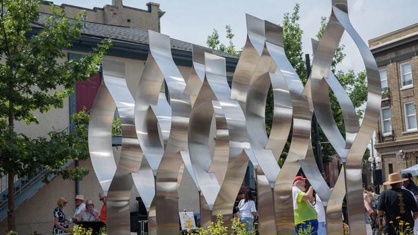 The Seed of Life Memorial, located at 530 E. Fifth St. in Dayton was unveiled on Aug. 4, 2024, five years after the mass shooting that left nine people dead and more than two dozen injured in Dayton's Oregon District. TOM GILLIAM / CONTRIBUTING PHOTOGRAPHER