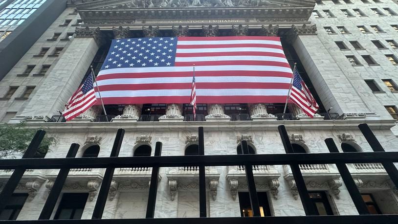 American flag hang from the front of the New York Stock Exchange on Tuesday, Sept. 10, 2024, in New York. (AP Photo/Peter Morgan)