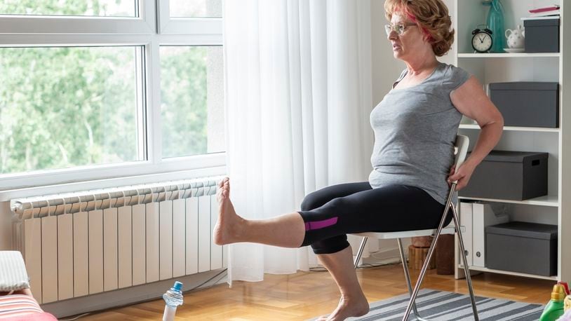 Every half hour or so, stand up and stretch. Just the act of going from a seated to a standing position helps to strengthen the lower body, increase circulation and provide a well needed stretch to shortened muscles. iSTOCK/COX