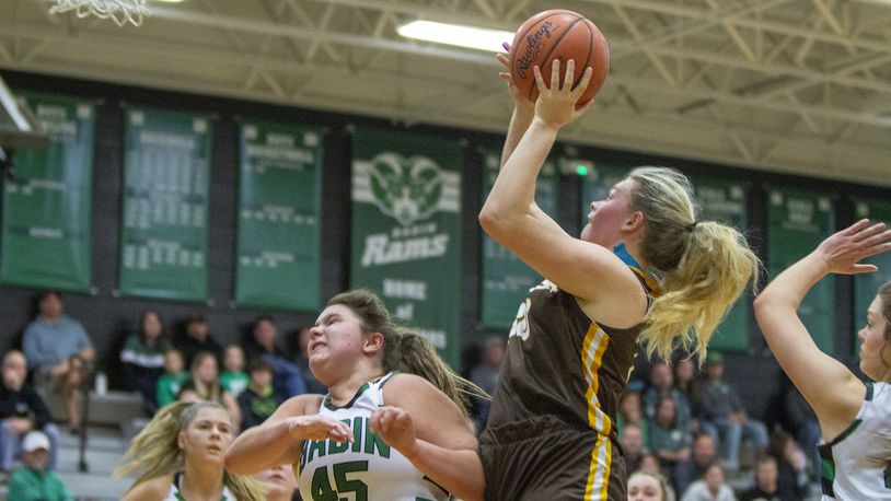 Alter's Maddie Moody shoots over Badin's Brooke Sebastian during a game earlier this season. CONTRIBUTED/Jeff Gilbert