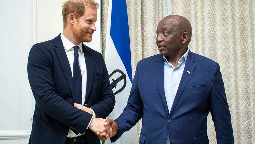 In this photo supplied by the Lesotho Government, Britain's Prince Harry, left, shakes hands with Lesotho's Prime Minister Sam Matekane, on Wednesday, Oct. 2, 2024 while visiting the tiny mountain kingdom where he co-founded a youth-focused charity in 2006 in honour of his late mother, Princess Diana. (Lesotho Government via AP)