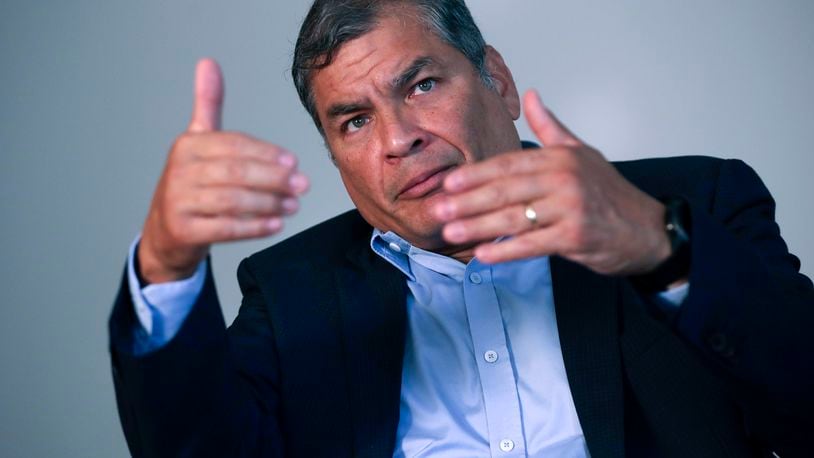 FILE - Former Ecuador President Rafael Correa gestures during an interview with Associated Press in Brussels, Sept. 11, 2020. (AP Photo/Francisco Seco, File)