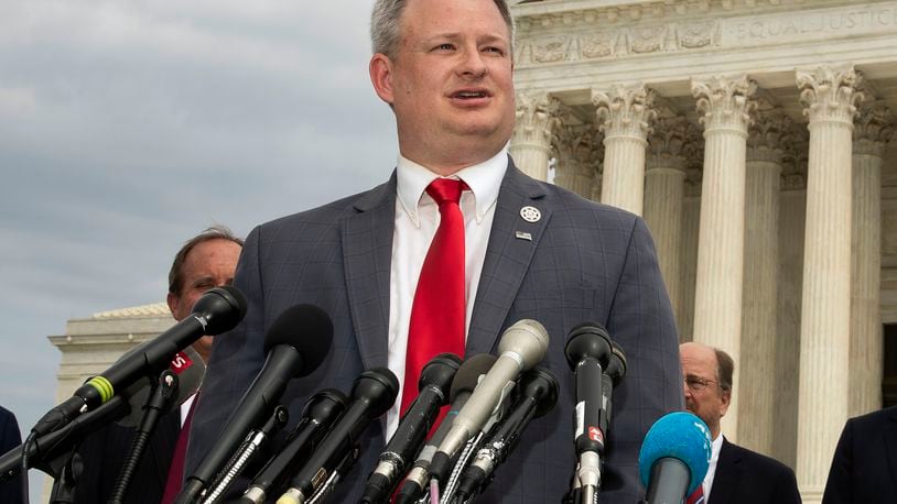 FILE - South Dakota Attorney General Jason Ravnsborg speaks to reporters in front of the U.S. Supreme Court in Washington on Sept. 9, 2019. (AP Photo/Manuel Balce Ceneta, File)