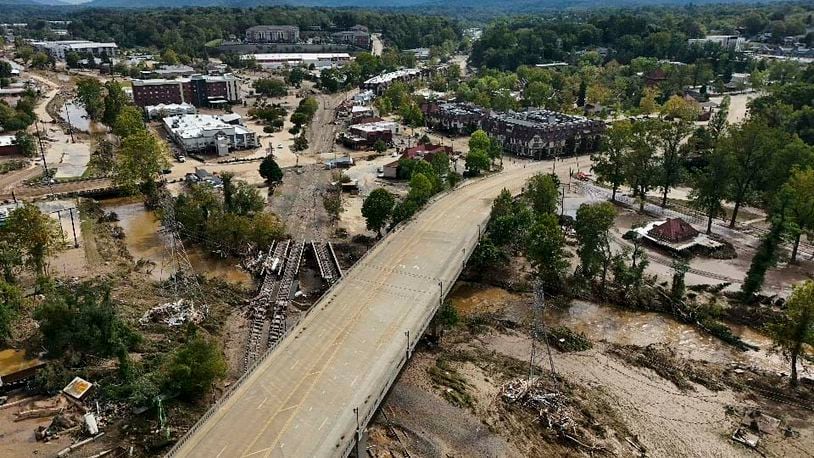 Debris is seen in the aftermath of Hurricane Helene, Monday, Sept. 30, 2024, in Asheville, N.C. (AP Photo/Mike Stewart)