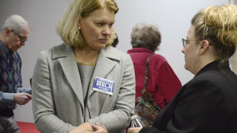 Twelfth District Court of Appeals Judge candidate Mary Lynne Birck talks with Butler County Probabte Judge candidate Heather Cady ahead of the Miami Regionals candidates forum at the Miami Hamilton Downtown center on Tuesday, Feb. 11, 2020. MICHAEL D. PITMAN/STAFF