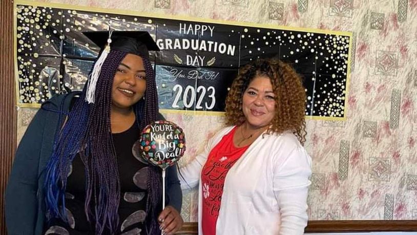 Keziah Lewis, left, graduates from the University of Cincinnati on April 29, nearly six years after she survived an Ohio State Fair ride crash that killed her boyfriend, Tyler Jarrell.  CLARISSA WILLIAMS VIA WCPO/CONTRIBUTED