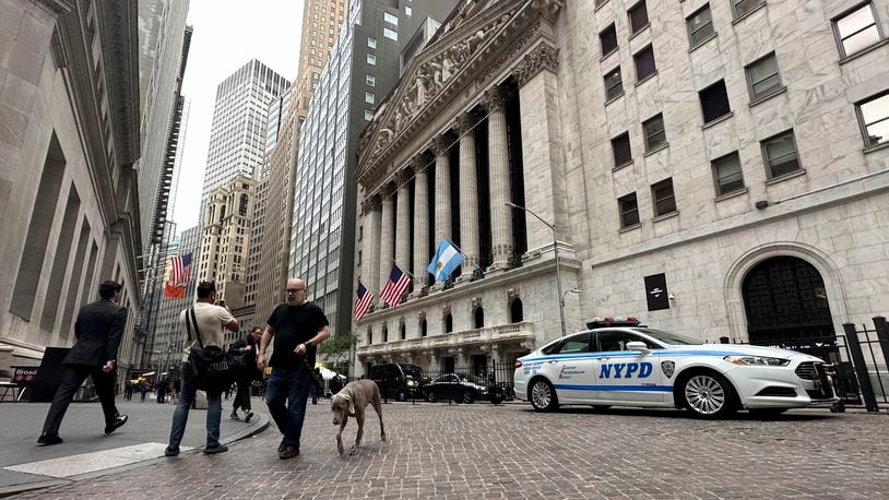 The flag of Argentina flies on the front of the New York Stock Exchange where Argentine President Javier Milei will ring the opening bell on Monday, Sept. 23, 2024, in New York. (AP Photo/Peter Morgan)