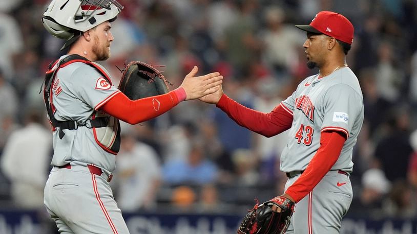 Cincinnati Reds pitcher Alexis Díaz, right, celebrates with catcher Tyler Stephenson after a baseball game against the New York Yankees, Tuesday, July 2, 2024, in New York. The Reds won 5-4. (AP Photo/Frank Franklin II)
