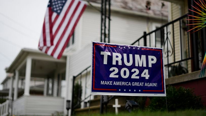 A sign supporting Republican presidential nominee former President Donald Trump is posted in Jim Hulings, chairman of the Butler County Republican Committee yard in Zelienople, Thursday, Sept. 26, 2024. (AP Photo/Matt Rourke)