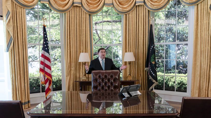 White House Historical Association President Stewart McLaurin tour members of the media in a replica of the Oval Office as is today, shown at The People's House exhibit, Monday, Sept. 16, 2024 in Washington. (AP Photo/Jose Luis Magana)